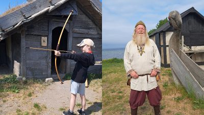 Per Andersson i vikingakläder samt eleven Ludvig som skjuter med en pilbåge.